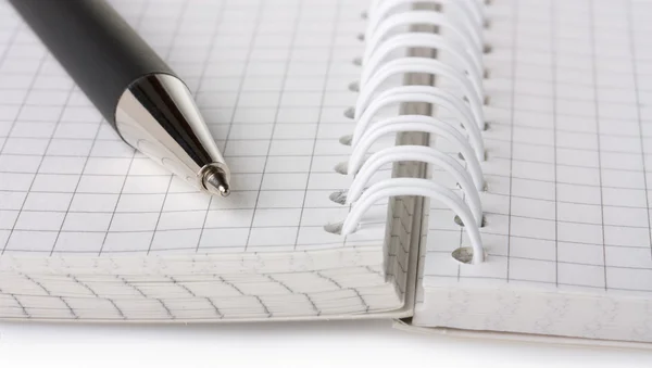 Pen on notebook — Stock Photo, Image