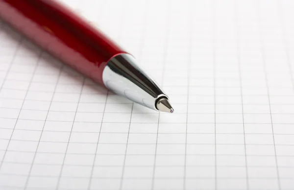 Ballpoint pen on notebook — Stock Photo, Image