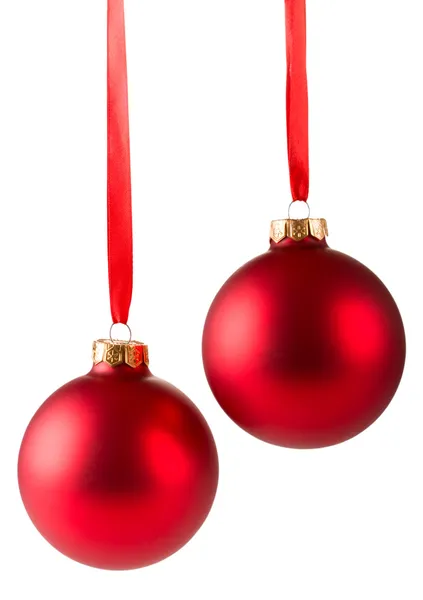 Dvě červené vánoční koule visící Stock Snímky
