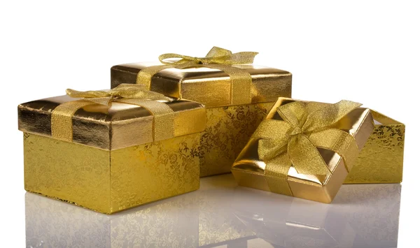 Presente de Natal dourado três caixas — Fotografia de Stock