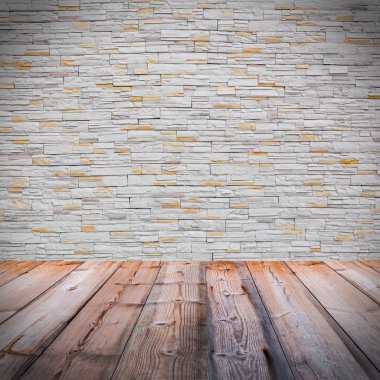 ahşap zemin ile beyaz tuğla duvar