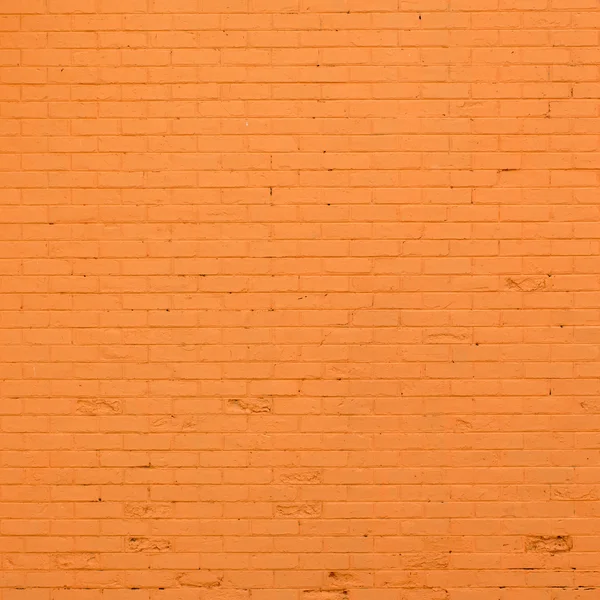 Orangefarbene Ziegelsteinwand — Stockfoto