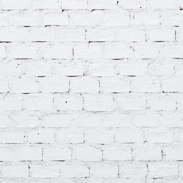 Eine weiße Ziegelmauer — Stockfoto