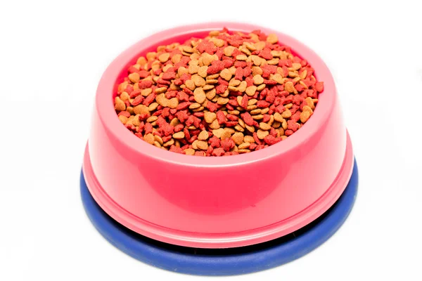 Dry cat food in pink bowl isolated on white — Stock Photo, Image