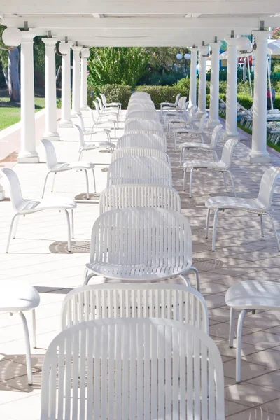 Chairs under a patio — Stock Photo, Image