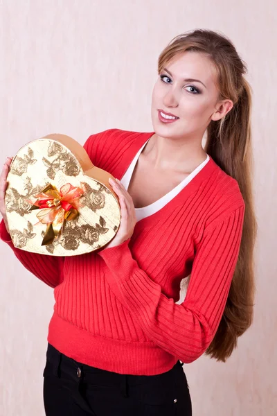 Young smiling woman in red jacket — Stock Photo, Image