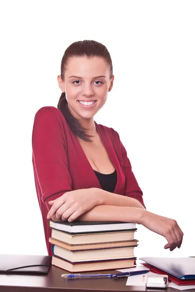 Student with books on table Stock Photo