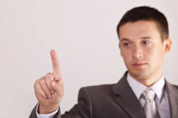 Businessman with finger pressing — Stock Photo, Image