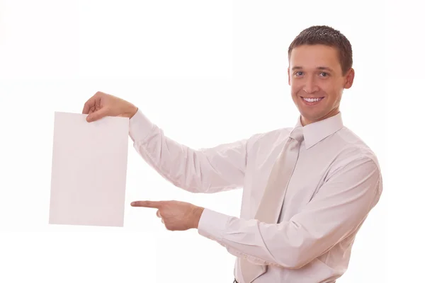 Man shows finger on blank paper — Stock Photo, Image