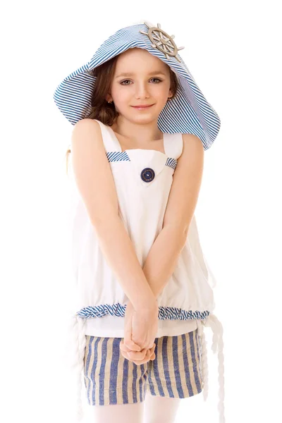 Knap en blij meisje in hoed — Stockfoto