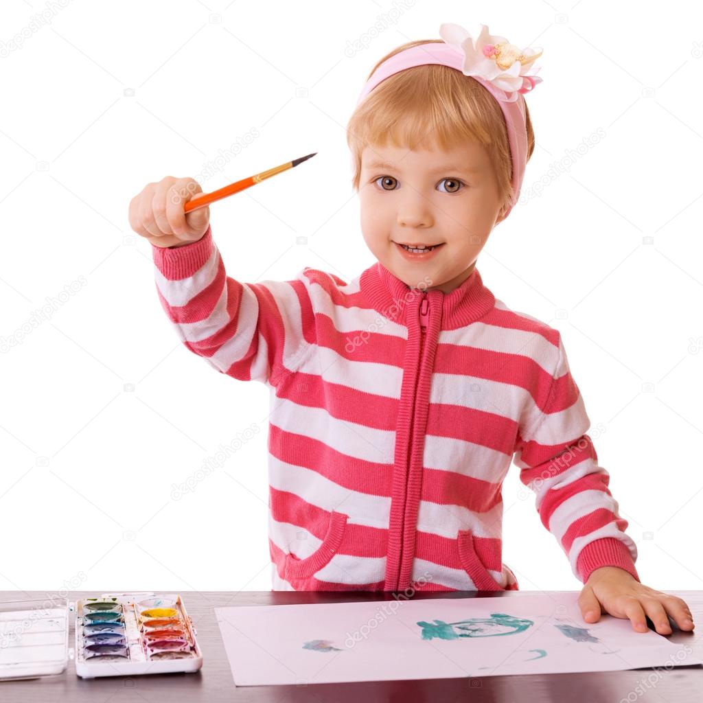 little girl draws paints