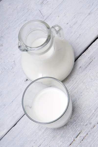 Ug and glass with milk and sugars — Stock Photo, Image