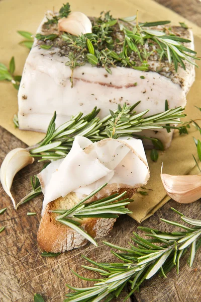 Mediterranean diet, bacon with herbs. — Stock Photo, Image