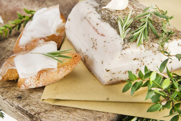 Mediterranean diet, bacon with herbs. — Stock Photo, Image