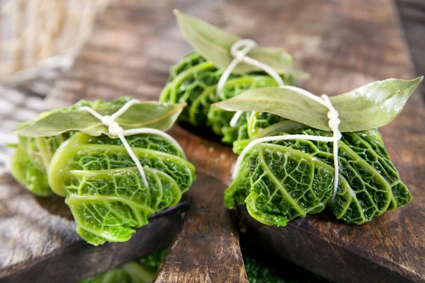 Bundle Of Meat In Cabbage Leaves — Stock Photo, Image