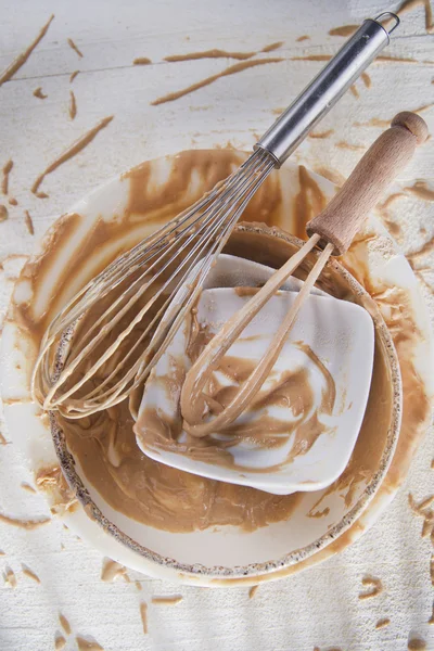 Peitsche und nach der Zubereitung von süßen Speisen — Stockfoto