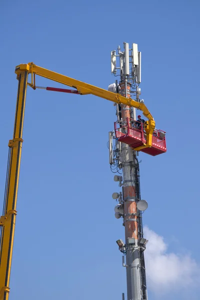 Maintenance to an antenna for communications — Stock Photo, Image