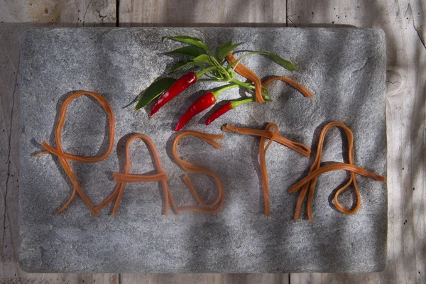 Pasta en una piedra para publicidad — Foto de Stock