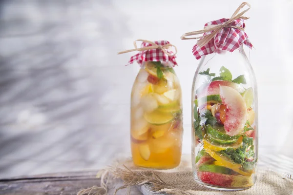 Infusion of tea peach and lemon — Stock Photo, Image