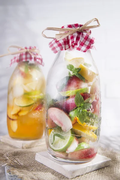 Infusion of tea peach and lemon — Stock Photo, Image