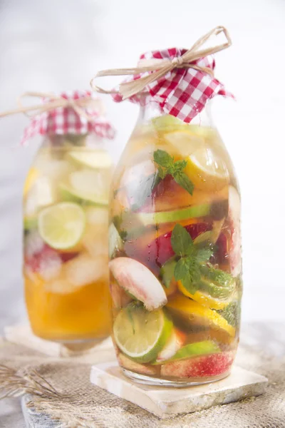 Infusion of tea peach and lemon — Stock Photo, Image