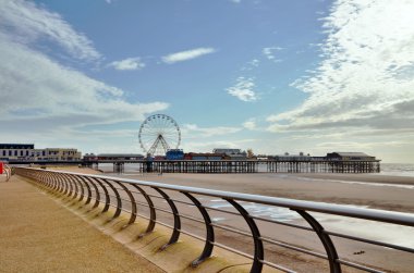 Blackpool promenade with the pier. clipart