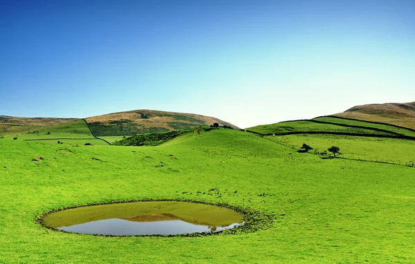 Dew pond on the Pennines — Stock Photo, Image