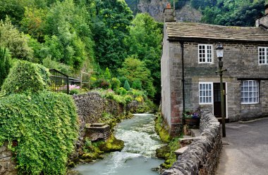 River and cottage in Castleton,Derbyshire clipart