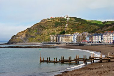 Colourful buildings by North Beach, Aberystwyth clipart
