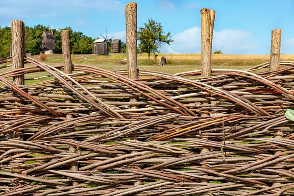 Wicker Old Fence Made Wooden Intertwined Thin Branches Background Agricultural — Stock fotografie