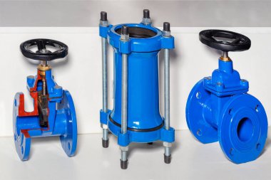 Cross-sectional mock-up of a metal check valve and coupling demonstrating function and operation in piping and circulation systems. Close-up, copy space.