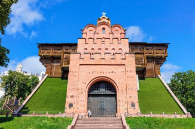 The historical building of the Golden Gate, the main entrance to the fortifications of Kyiv in the 11th century. Photo against a blue sky on a summer day. August 21, 2022 Kyiv, Ukraine.