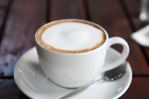 Café sobre fondo de madera — Foto de Stock