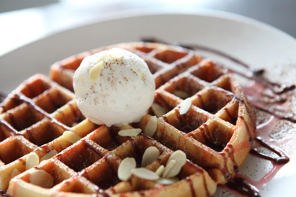 Waffle with ice cream on wood background — Stock Photo, Image