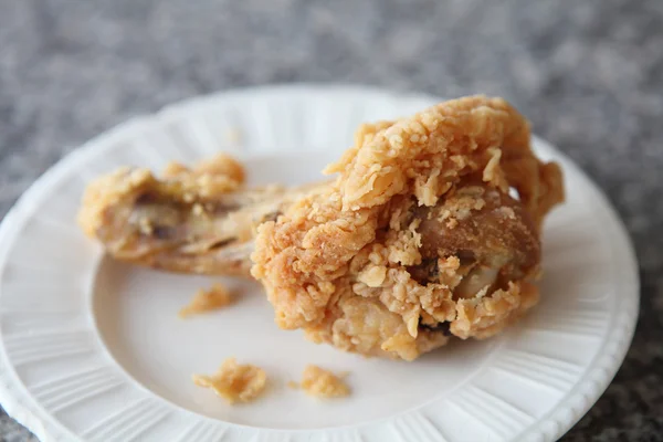 Fried chicken on wood background — Stock Photo, Image