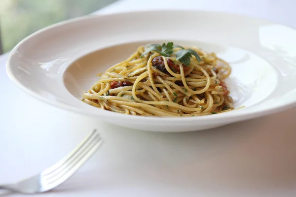 Spaghetti with a spicy scallop — Stock Photo, Image