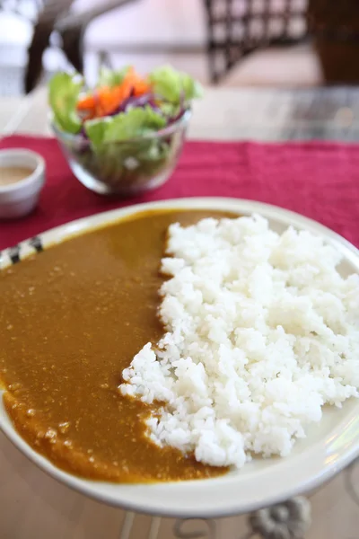 Curry rice with salad — Stock Photo, Image