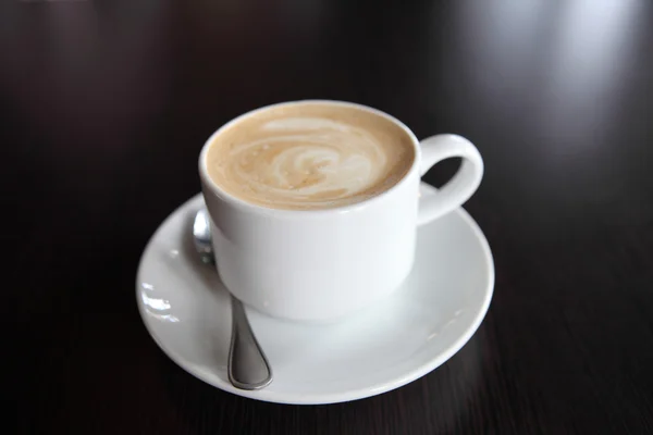 Café sobre fondo de madera — Foto de Stock