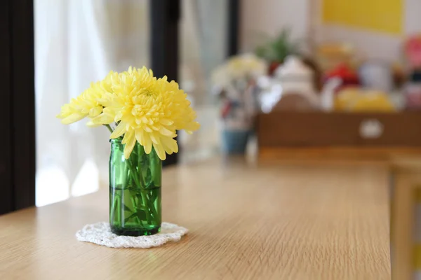 Yellow flower in jar — Stock Photo, Image