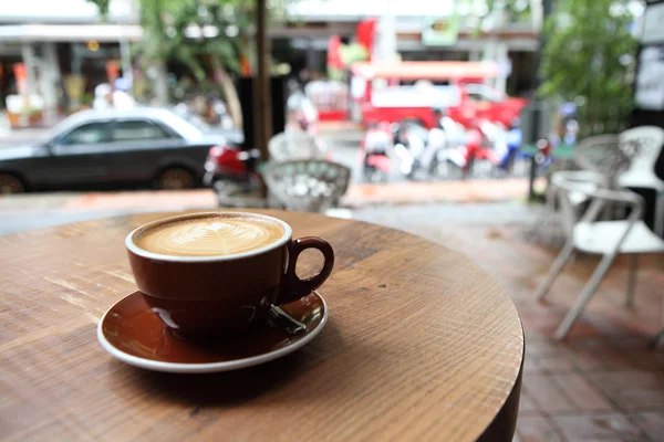 Kaffee auf Holz Hintergrund — Stockfoto