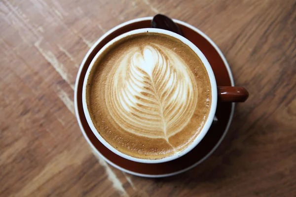 Café sobre fondo de madera — Foto de Stock