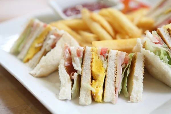 Club sandwich with on wood background — Stock Photo, Image