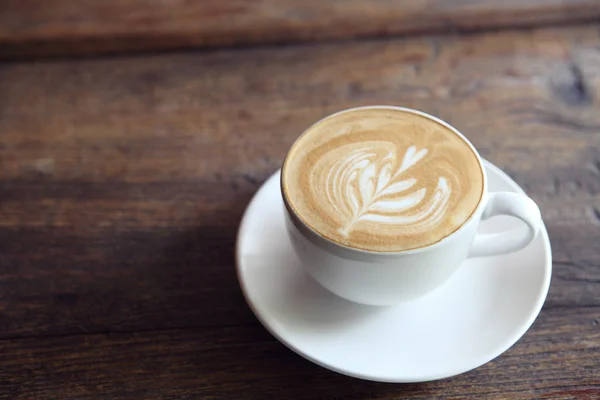 Kaffee auf Holz Hintergrund — Stockfoto