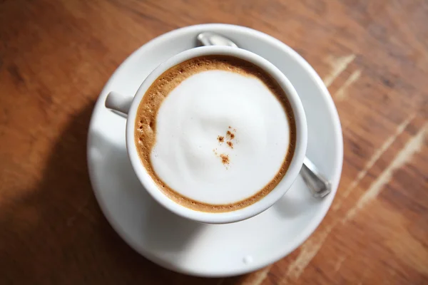 Kaffee auf Holz Hintergrund — Stockfoto