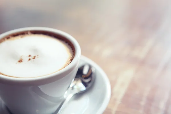 Kaffee auf Holz Hintergrund — Stockfoto