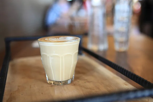 Café sobre fondo de madera — Foto de Stock