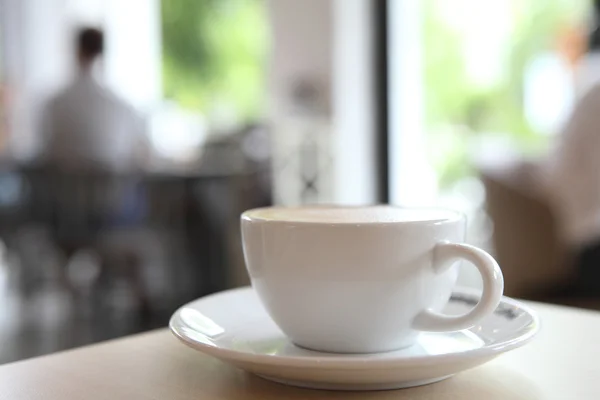 Kaffee auf Holz Hintergrund — Stockfoto