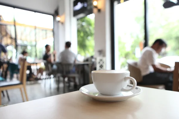 Koffie op hout achtergrond — Stockfoto