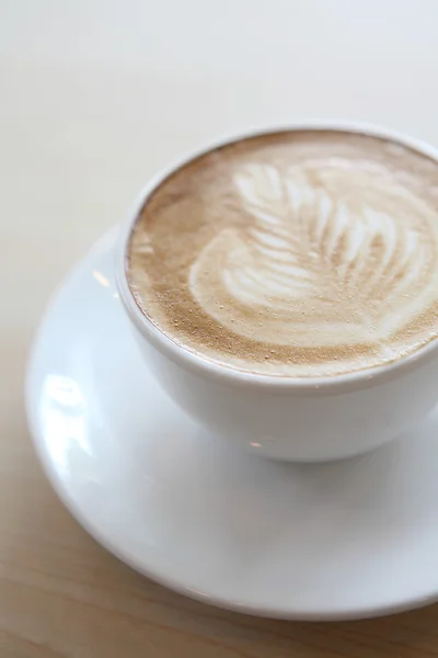 Kaffe på trä bakgrund — Stockfoto