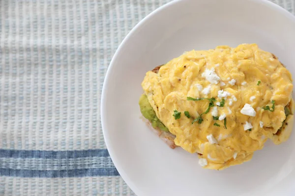 Avocado and scrambled eggs toast